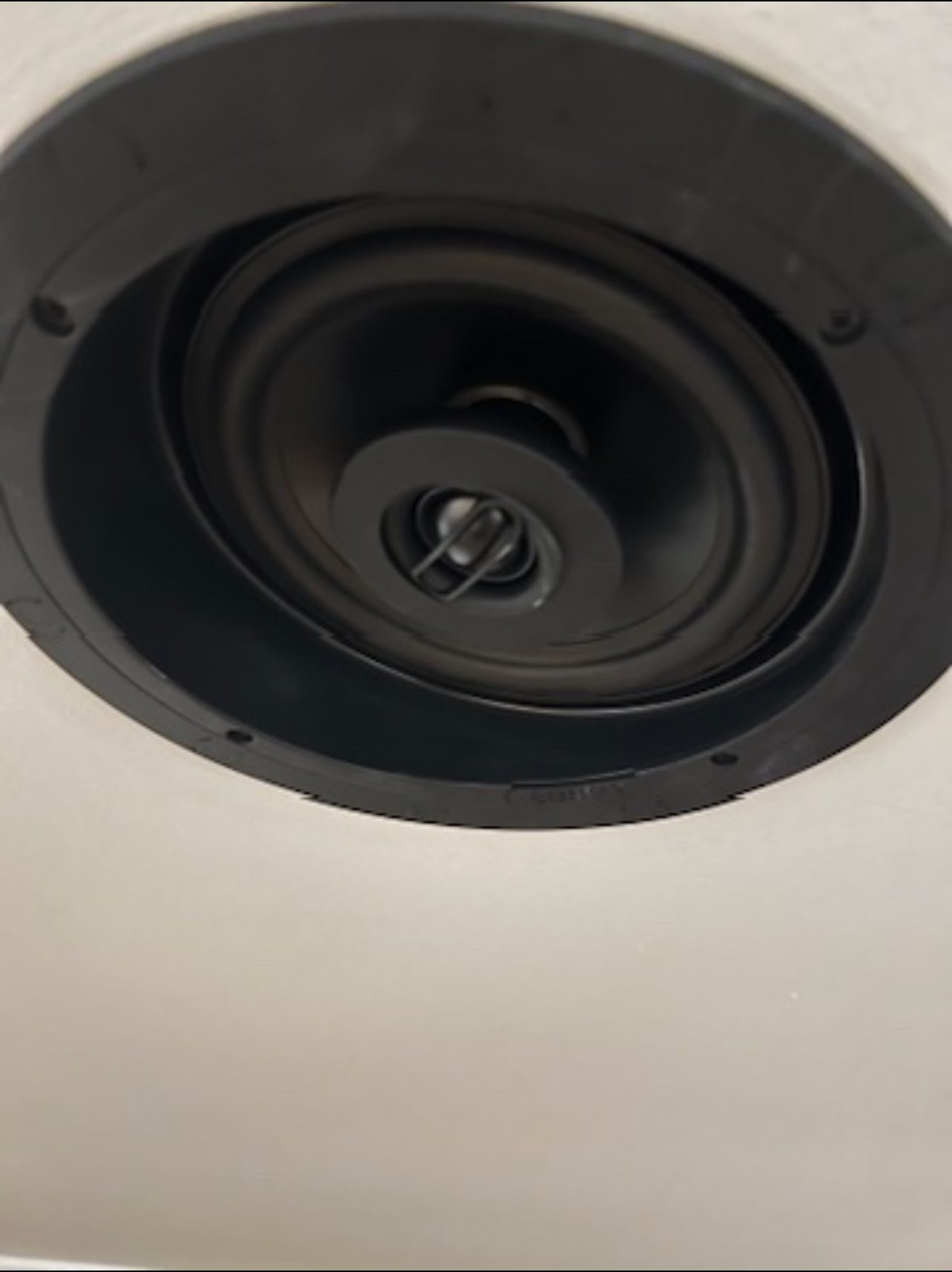 Sonance in-ceiling round, paint-matched grille