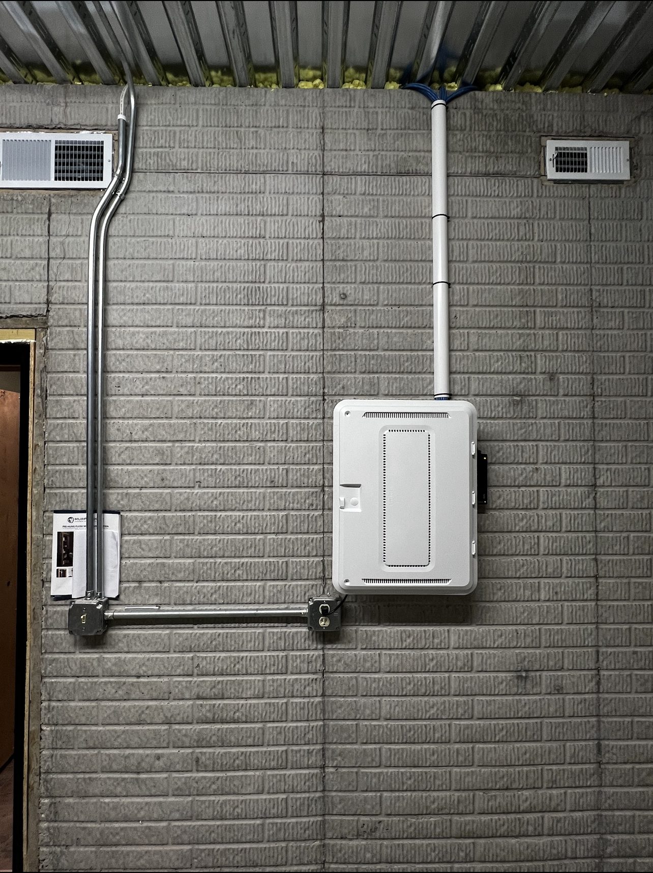 Structured wiring panel with conduit