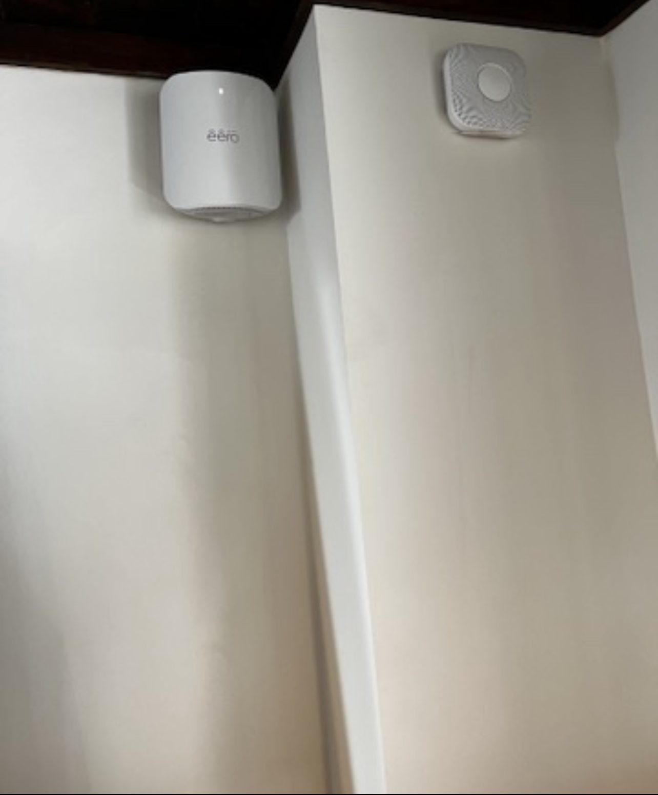 Ceiling-corner sensors trigger lights, climate, shades