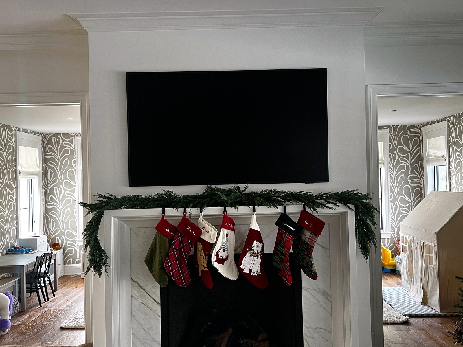 TV on marble mantel family room