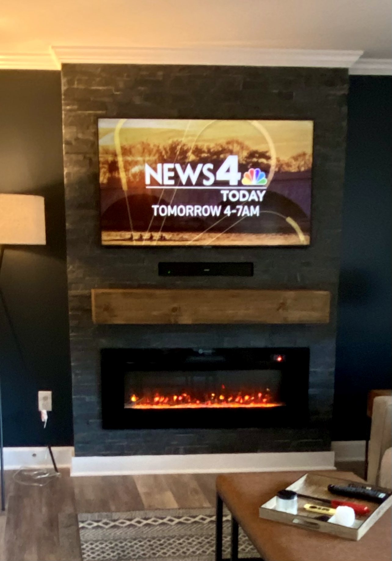 Wood-clad accent wall with mounted TV